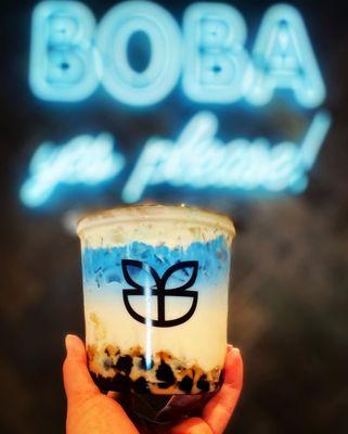 My fave - the "Seaside" - brown sugar milk tea with sea salt cream, topped with beautiful Butterfly Pea Tea! Here with honey boba added