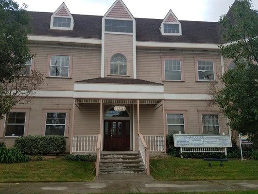 The front of the building, on Olive Ave.