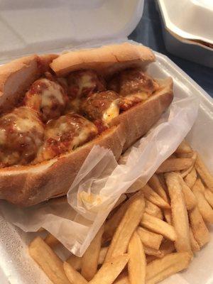 Meatball parm sandwich with fries