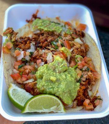 Campechano Taco: suadero and chorizo, guacamole, onions, cilantro (91/100)