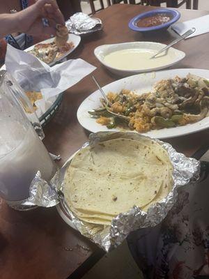 Jalesquitos  flour tortillas, and the delicious Queso with horchata to wash it all down with!