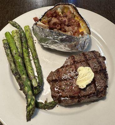 8oz Sirloin,  baked potato & grilled asparagus.