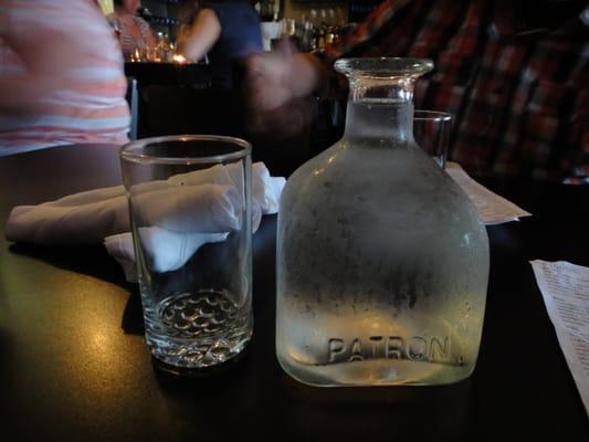 They use a large patron bottle for water