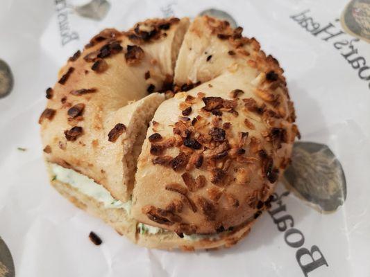 Onion bagel with chives cream cheese