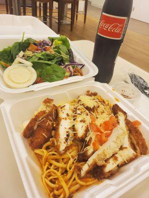 Crusted chicken with pasta, marinara and side salad.