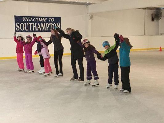 Our newly renovated ice rink being enjoyed by young skaters taking a lesson.