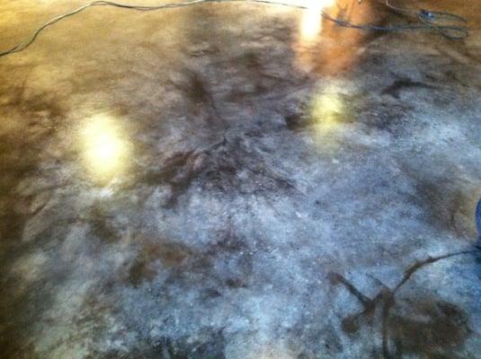 This old concrete floor was cleaned up and stained for a cool new look.