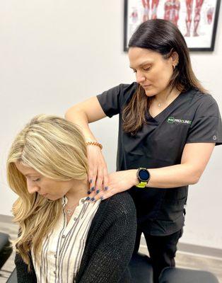 Dr Stefanie Tropea, DC ProClinix Armonk Chiropractor utilizing Active Release Techniques for neck tightness that caused pain and headaches.