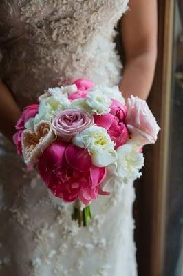 Fuchsia  and white peonies, ivory and peach spray roses, blush and light pink garden roses.