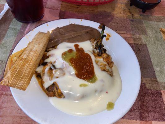 Chili rellenos with queso , tamale and beans