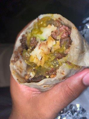 Steak Burrito no tomato no sour cream add rice to it ya dig !