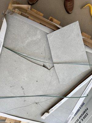 Box after box of broken tiles