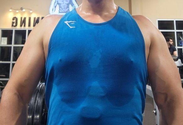 Minutes into a workout (wet shirt). It's too hot to lift weights here. Try other gyms out to see the AC difference.