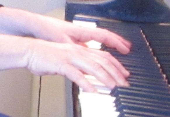 Rebecca's hands on the keys