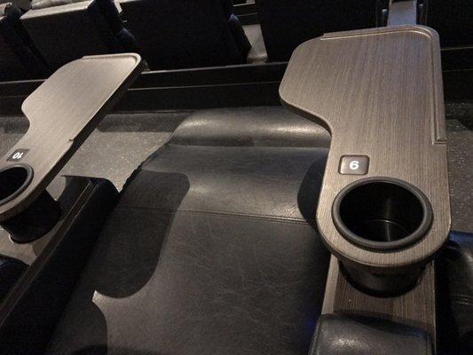 New theaters with recliner leather seats and tray tables for your food