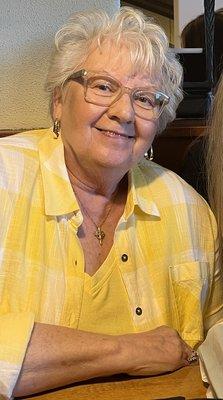 My yellow blouse and me posing for a picture