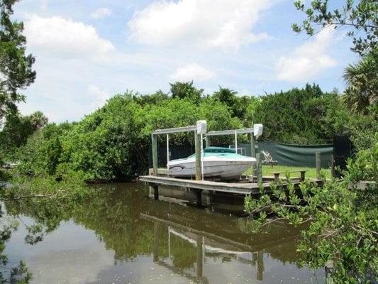 Like to fish?  Beachside canal lot ready to build your Flagler Beach home.  Dock with a 6,000 pound lift ready for your boat ...