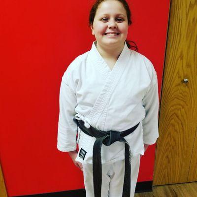 Feeling like a Rock Star! Ms. Maddison earned "Black Belt for a Day" though hard work and focus.