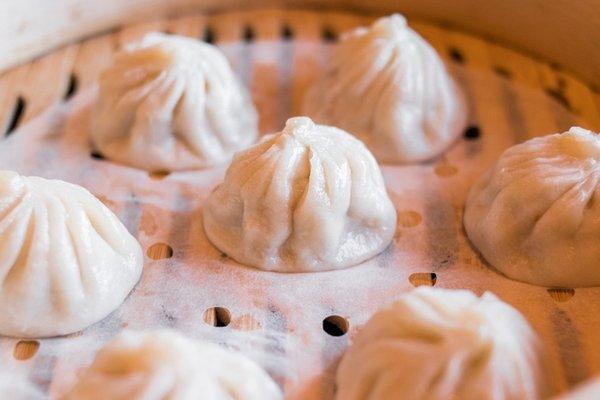 'XLB' Soup Dumplings - Shanghai-style steamed juicy pork soup dumplings with a classic soy vinegar dip.