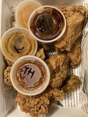 Friends order of Thai Wings and sauces