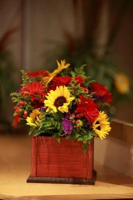 Beautiful Centerpieces made by my dad and myself and filled with amazing, fun flowers by Robin!