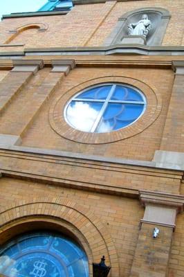 The best pic he took, the Virgin Mary in front of the church. above the window cross.