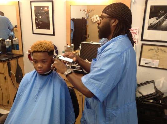 Travis has this young man's hair matching his handsome looks!