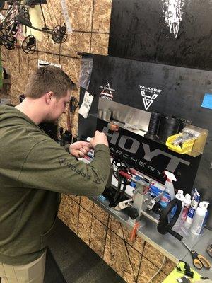 Brandon setting up the peep sight.