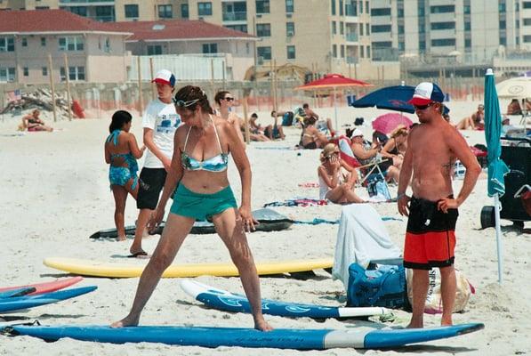 Jeff at Skudin Surf teaching a new student the fine points on board balance. Long Beach NY July 19, 2013.