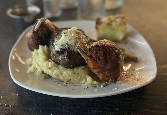 Surf and turf on mashed potatoes 6oz filet with two stuffed shrimp