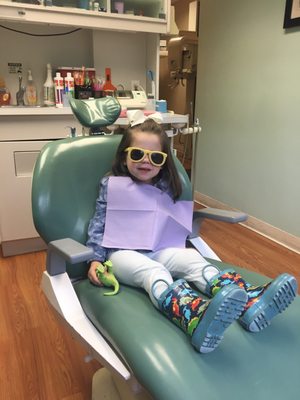 Ready for her teeth cleaning with some cool shades