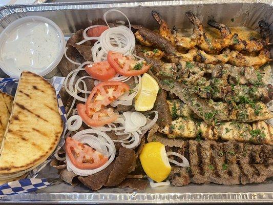 Hercules-  skewers of filet mignon, pork, shrimp & chicken, 2 pounds gyro meat, pita, and tzatziki.