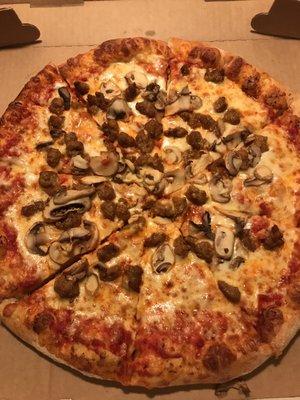 Large sausage and mushroom pizza that I just brought home. ABSOLUTELY DELICIOUS