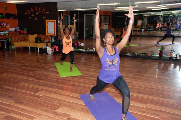 Instructors doing a Yoga Workshop