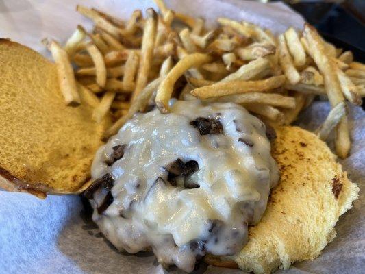 Mushroom Swiss burger with fries