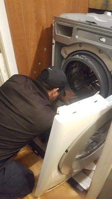 Water pump replacement of a  Whirlpool front load washer in Garner, NC