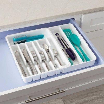 Keep your silverware & utensils accessible with this adjustable drawer organizer.