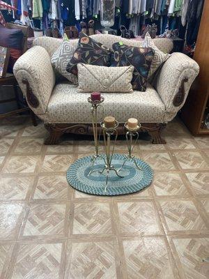 An antique couch featured at Redeemed Thrift Store.