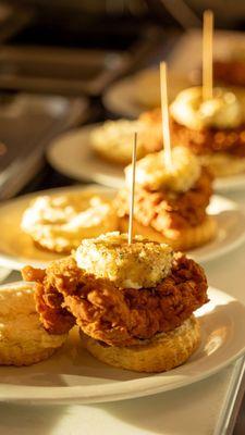 A line of Squawking Goat biscuit sandwiches being prepared for guests.