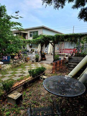 June 2022: In the back yard facing the main building