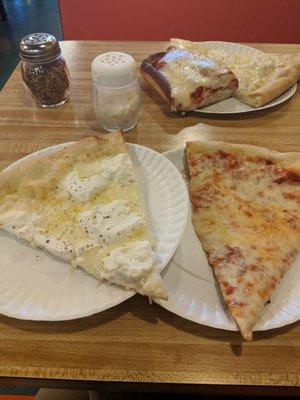 Slice of ricotta pizza and plain. Delicious!