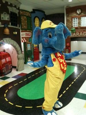 "Bubbles", our center's mascot is enjoying our indoor playground, "Make Believe Boulevard"!