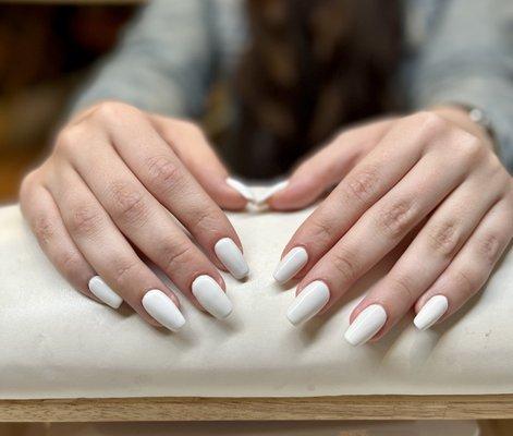 Gel extensions and manicure in a clean crisp white for summer