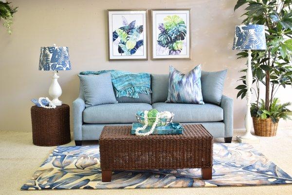 Bring the Aloha into your space with cool blues and twisted banana leaf accent tables.