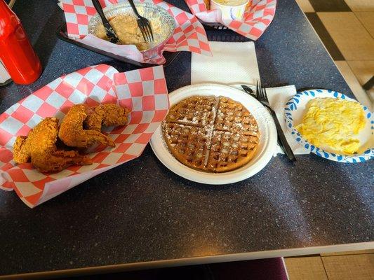 Chicken and waffles, a side of cheese eggs. Shrimp & grits. Food was absolutely favorable & delicious.