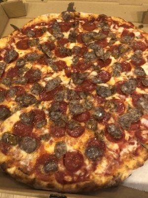 Sausage and pepperoni pizza