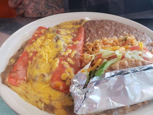 Mexican plate  2 cheese enchiladas Crispy beef taco  Rice and beans