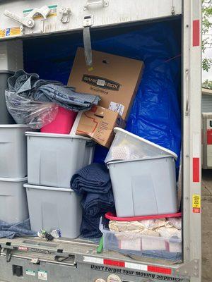 Folded, unused moving blankets while lots of our furniture was left unwrapped. Heavy items crushing lighter ones.