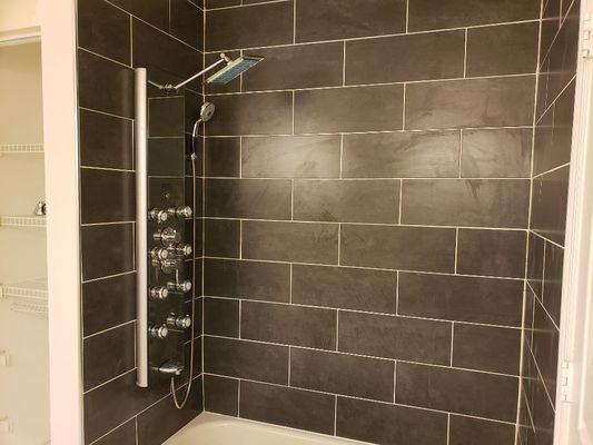 tiled tub walls with new panel