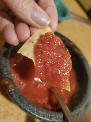 Warm tortilla chips and fresh salsa.